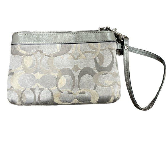 Grey cloth coach wristlet with leather accents and strap. Silver color. - Picture 2 of 11